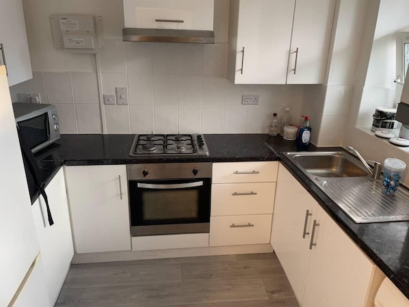 Apartment | Private kitchen | Fridge, microwave, oven, stovetop