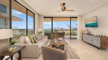 Grand appartement | Woonruimte | Een 50-inch flatscreentelevisie met digitale zenders