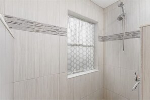 Shower, hair dryer, towels, soap