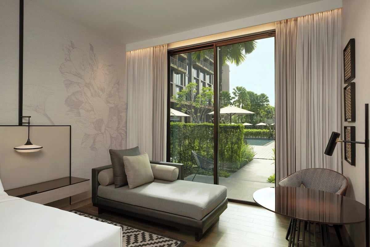 Deluxe Room, 1 King Bed, Non Smoking, Garden View | 1 bedroom, blackout drapes, soundproofing, free cribs/infant beds