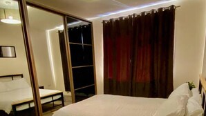3 عدّة غرف نوم ومكواة/لوح كي وواي فاي مجانًا وملاءات أسرّة