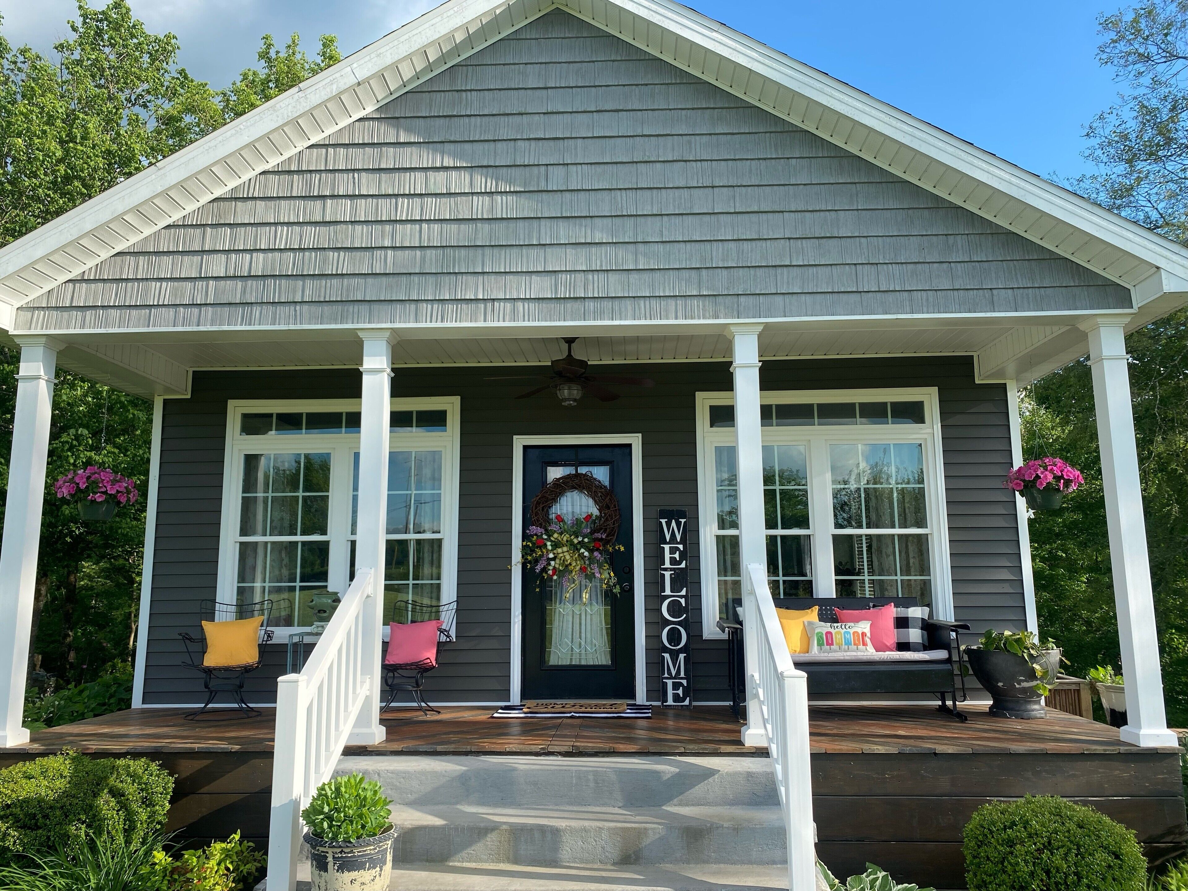Kick back and relax in this calm, stylish cottage on the creek.  