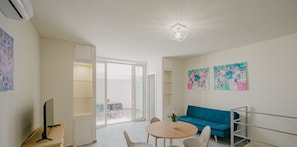 Basic-Apartment | Wohnbereich | 35-Zoll-Fernseher mit Digitalempfang