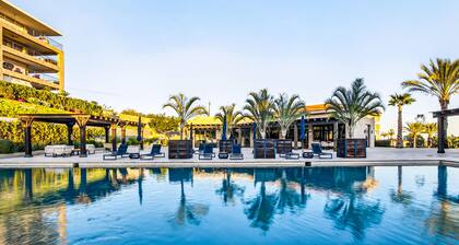 Modern apartment with. ocean view, pool, patio, tennis, & gym