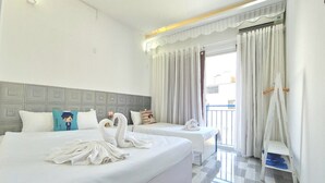 Triple Room | WiFi (free), bed sheets - TNJ TASMANIA HOTEL (Da Nang)