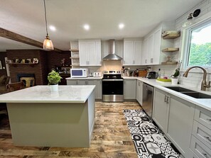 Private kitchen - Cozy front lake cottage #3 (Harrington)