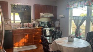 Microwave, stovetop, dishwasher, coffee/tea maker