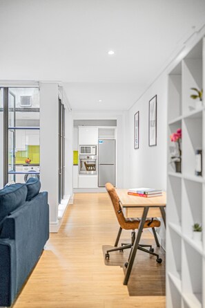 City Apartment | Living area | 40-inch Smart TV with satellite channels - 2BR with Patio in the Heart of Holborn (London)