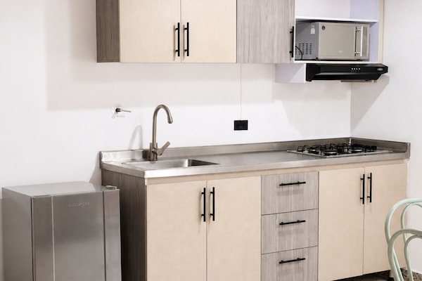Familien-Suite, Mehrere Betten, Whirlpool, Stadtblick | Eigene Küche | Grillplatte