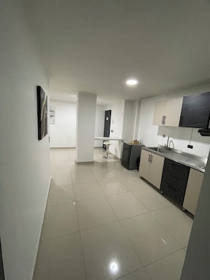 Family Apartment, 2 Bedrooms, Housekeeping, City View | Private kitchen | Griddle - Hotel Ofix - Laureles (Medellín)