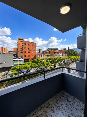 Deluxe Apartment, Hot Tub, City View | Balcony - Hotel Ofix - Laureles (Medellín)