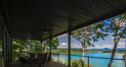 WANT AN AMAZING VIEW OF THE LAKE?? This modern home offers than just space!