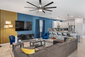 Televisor intel·ligent, videojocs i taula de tennis de taula 