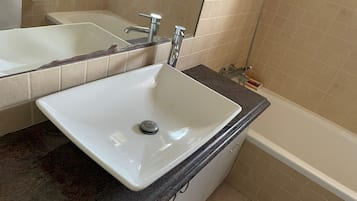 Hair dryer, towels, soap, shampoo