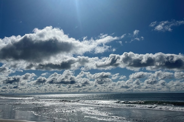 On the beach, sun loungers