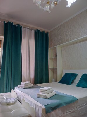 1 habitación, tabla de planchar con plancha, wifi gratis y ropa de cama 