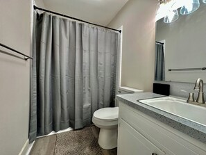 Hair dryer, towels, soap, shampoo