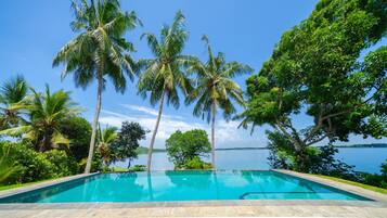 Outdoor pool, open 6:00 AM to 9:00 PM, free pool cabanas, pool umbrellas