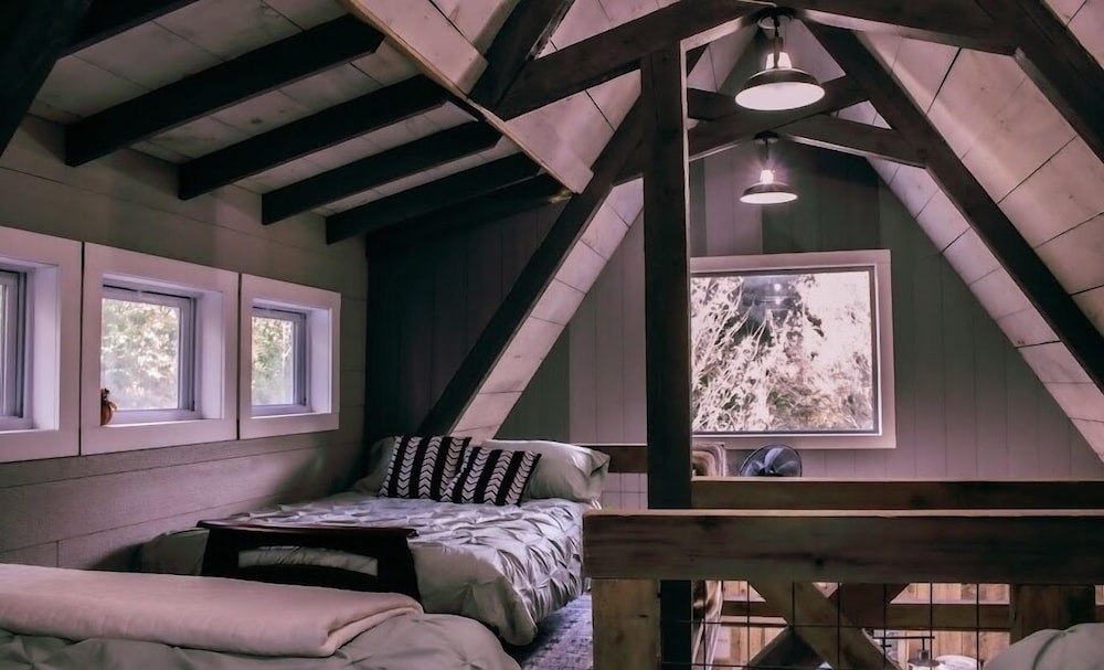 Image showcasing ** COZY OFF GRID LAVA HOME - 2 Stories, Ocean View