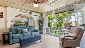 Condo, 1 King Bed with Sofa bed, Lanai, Garden View | Living area | TV