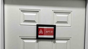 A white door with a keypad lock and a sign reading "APT 01". - 3Bed 2Bath Apt Near NYC + Parking & Laundry (Irvington)