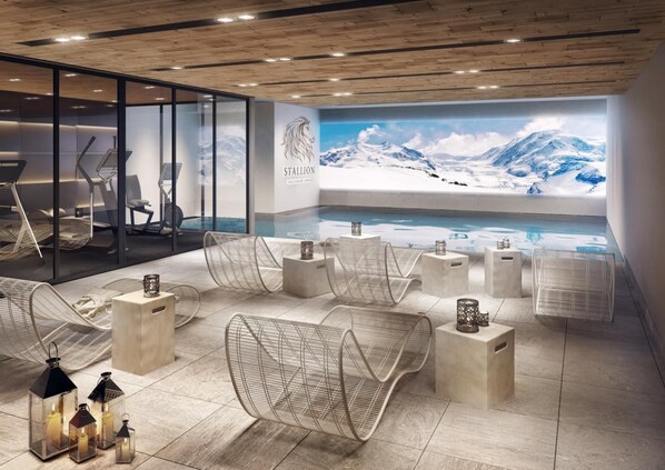 A modern spa area with a large wall mural, seating, and a view of a mountain landscape.