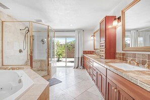 Jetted tub, hair dryer, towels, soap