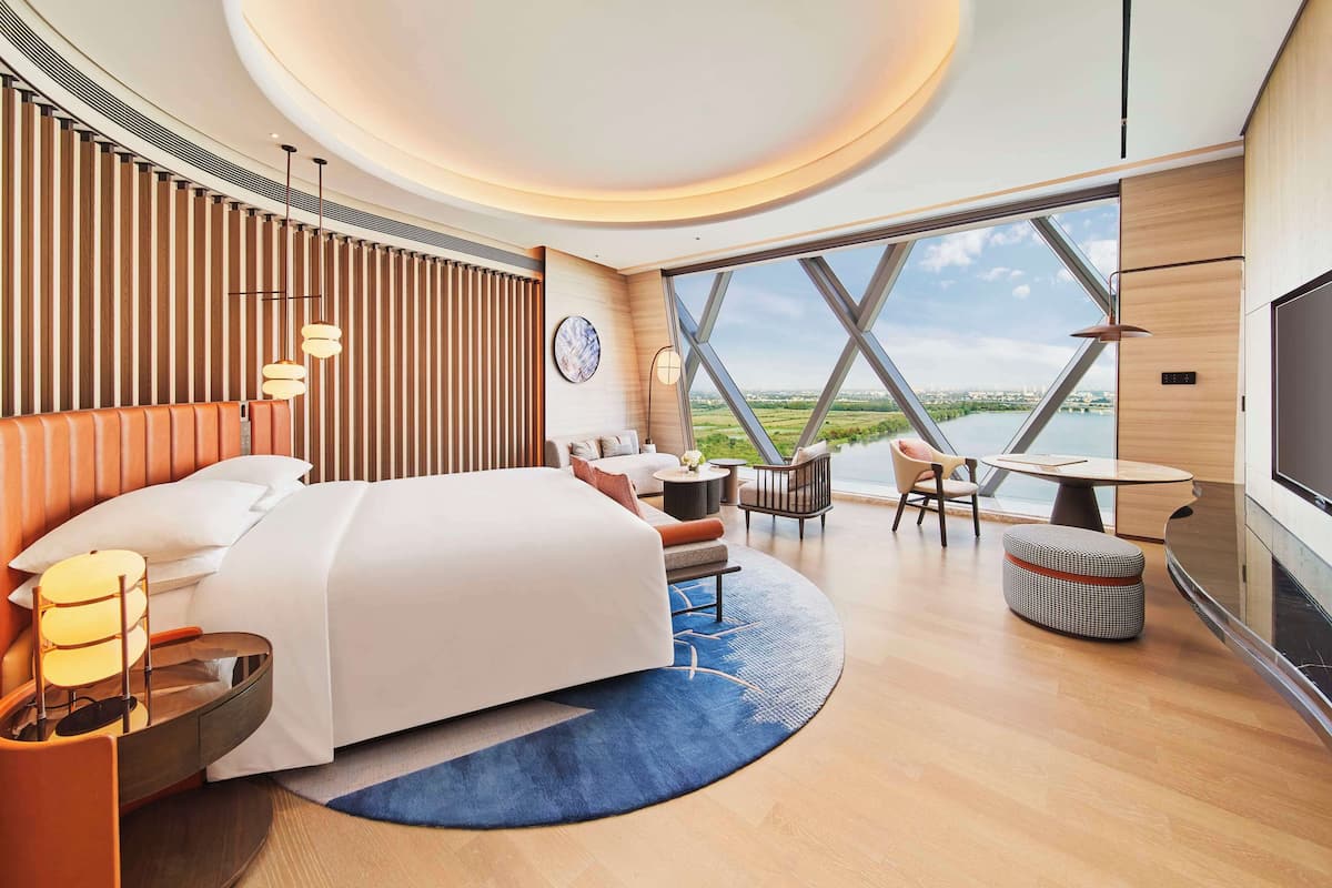 Premium bedding, down comforters, pillowtop beds, minibar