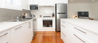 1 bedroom 2 bathroom house with wide verandah, sea views, incl car