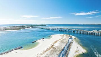 On the beach, sun loungers, beach towels
