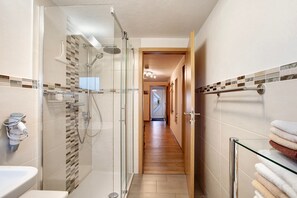 Shower, free toiletries, hair dryer, towels