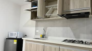 Mini-fridge, microwave, griddle