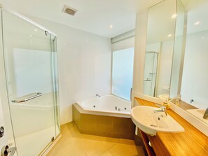 Jetted bath, hair dryer, towels, soap