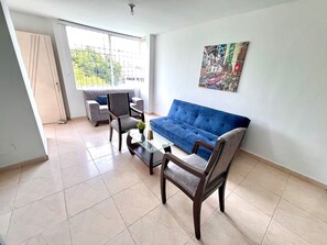 Appartement Familial | Coin séjour | Télévision