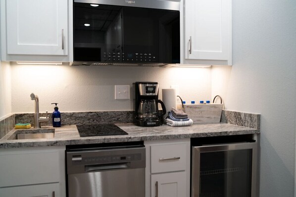 Microwave, coffee/tea maker, cookware/dishes/utensils