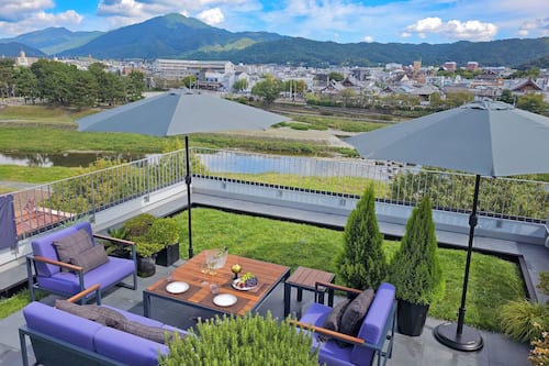 Breakfast, lunch, dinner served; Fusion cuisine, garden views