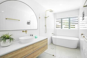 Bathtub, hair dryer, towels