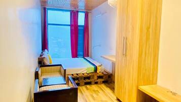 Standard Room | Desk, bed sheets