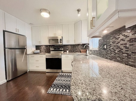 Fridge, microwave, oven, stovetop. Amazing South Tampa Home