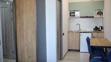 ستائر تعتيم ومكواة/لوح كي وواي فاي مجانًا وملاءات أسرّة