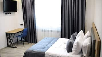 Blackout curtains, iron/ironing board, free WiFi, bed sheets