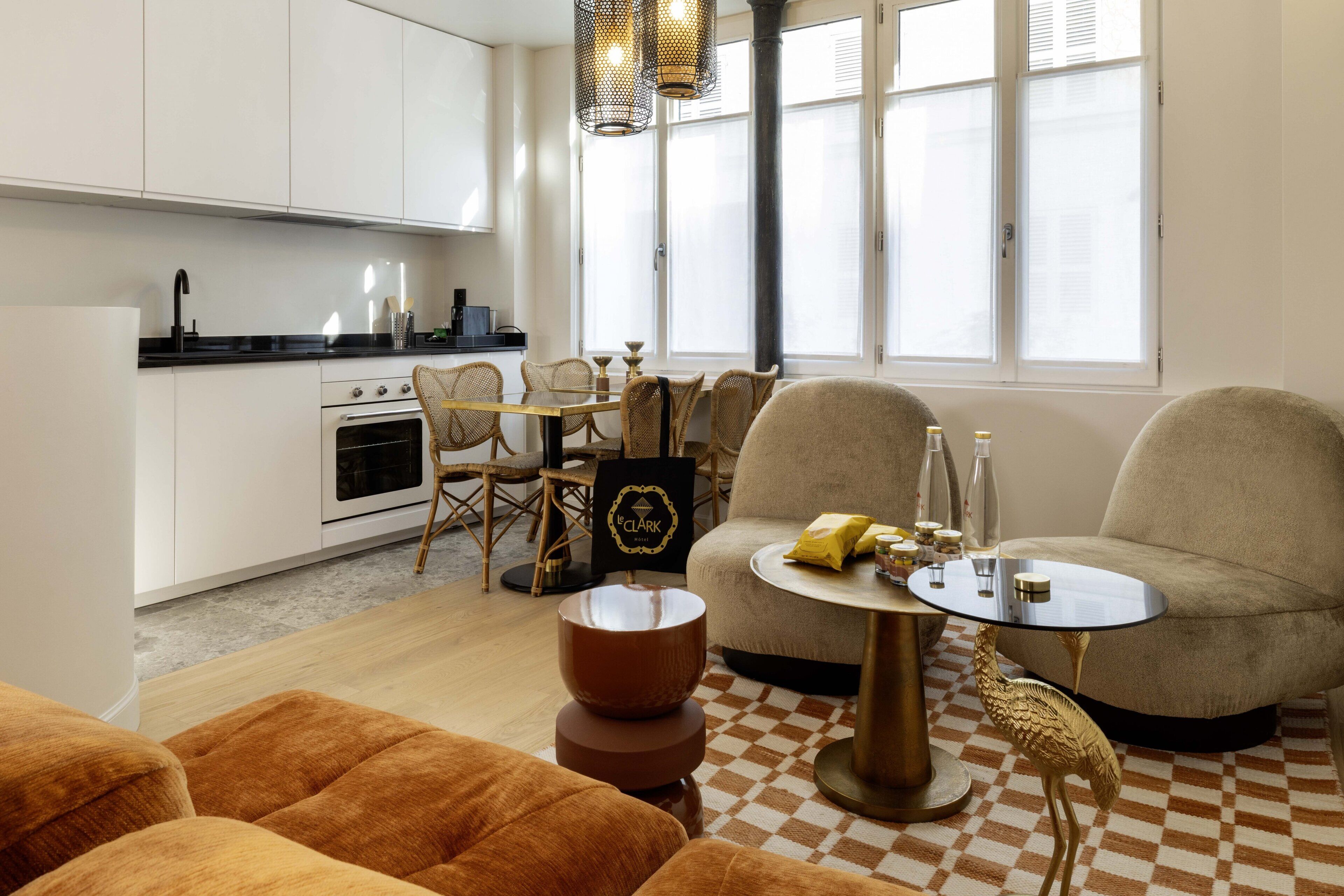 Deluxe Apartment | Living area | 12-inch flat-screen TV with digital channels