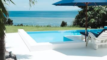 Outdoor pool, pool umbrellas, pool loungers