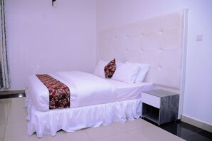 Desk, laptop workspace, free WiFi, bed sheets
