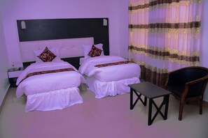Desk, laptop workspace, free WiFi, bed sheets