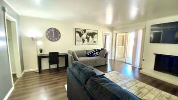 TV, fireplace, books, offices