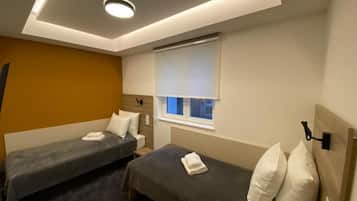 Basic Double or Twin Room, 2 Single Beds, Non Smoking | In-room safe, desk, soundproofing, iron/ironing board