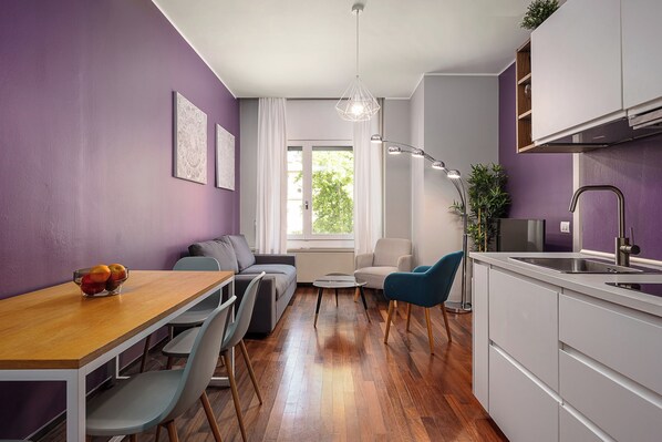 Fridge, microwave, electric kettle, dining tables