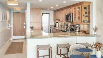 Coffee/tea maker, fridge, microwave, oven