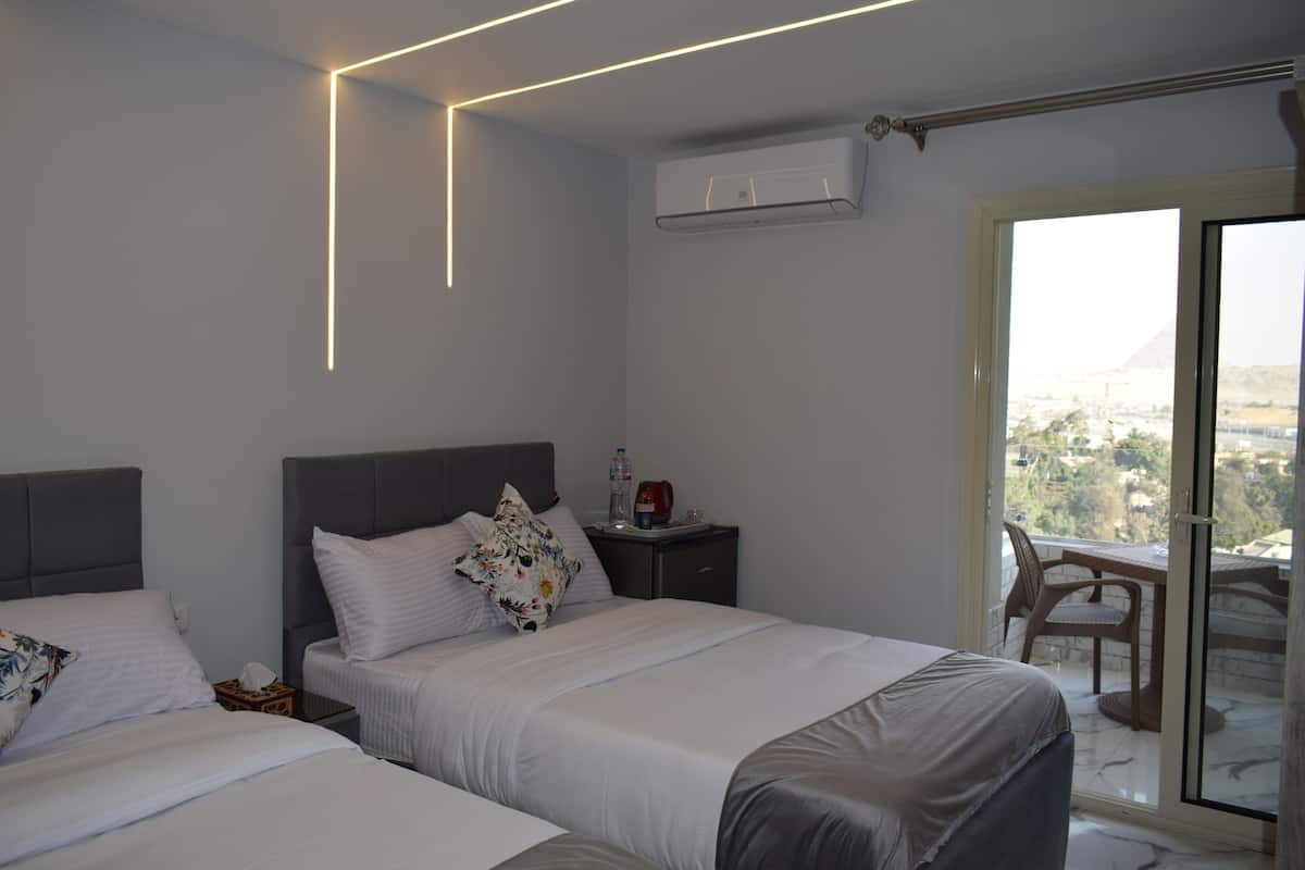 Deluxe Twin Room, Mountain View | 1 bedroom, minibar, free WiFi, bed sheets